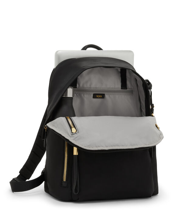 black tumi backpack with gold details | Voyageur The Celina backpack features internal room for items such as a laptop TUMI - Voyageur Montana Backpack