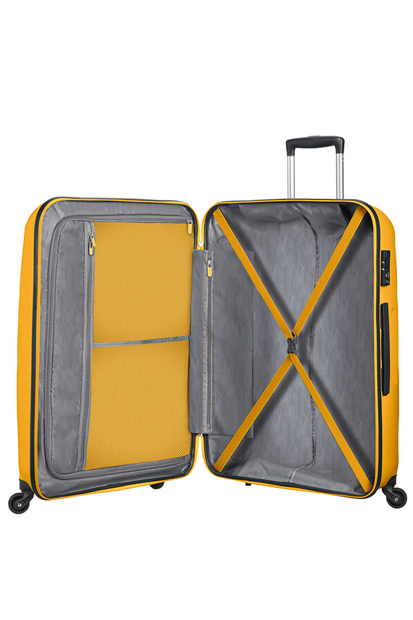 american tourister yellow luggage